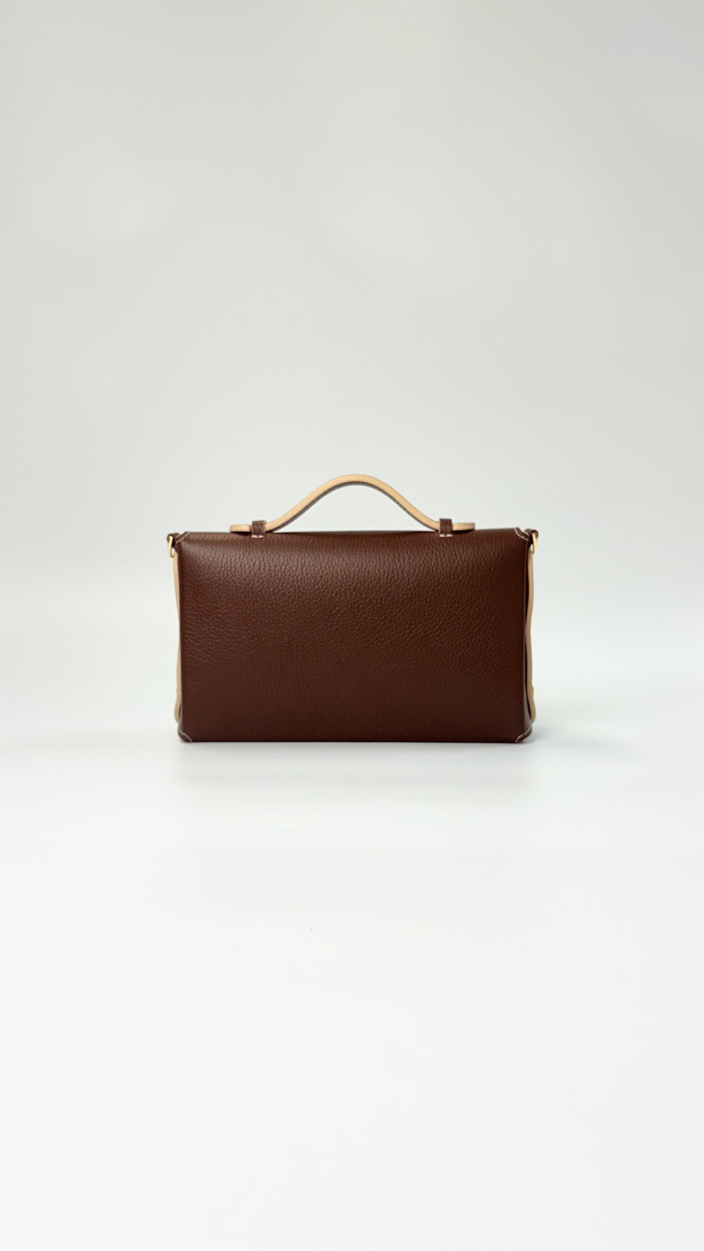 Sumi Crossbody Clutch Bag in Palisander with Gold Lock (with beige edge)