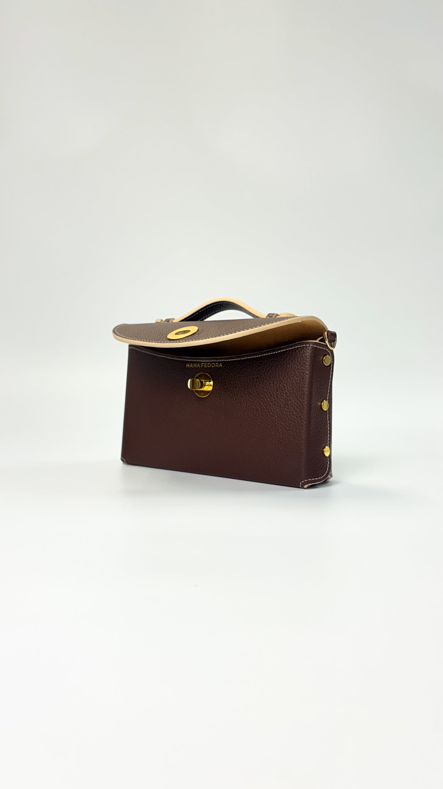 Sumi Crossbody Clutch Bag in Palisander with Gold Lock (with beige edge)