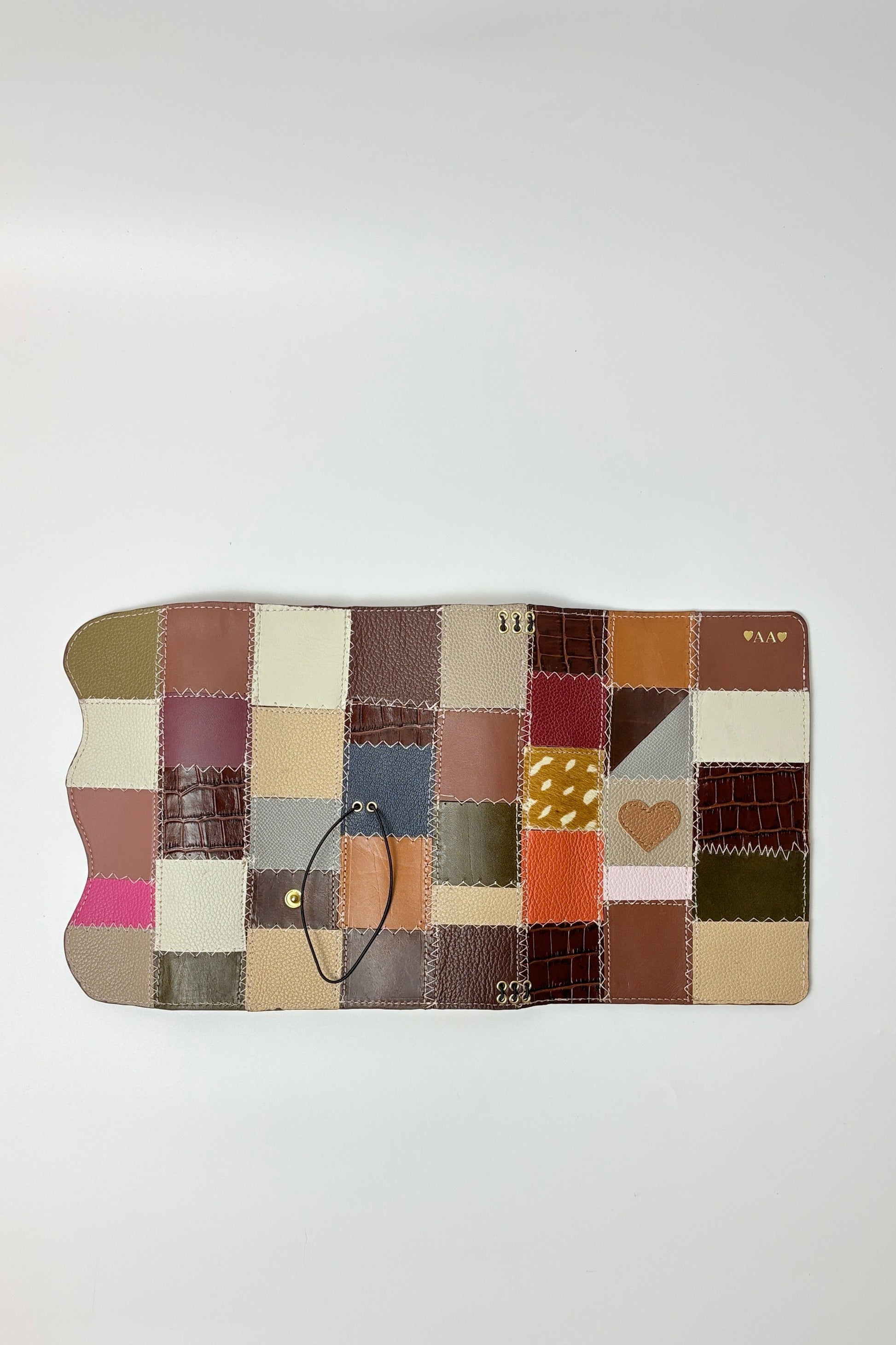 Patchwork phone case with multicolor pattern on a white background