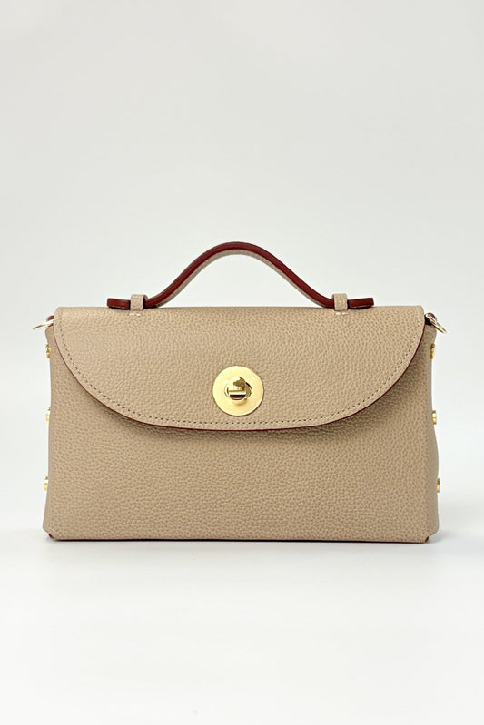 Beige handbag with a gold clasp on a white background