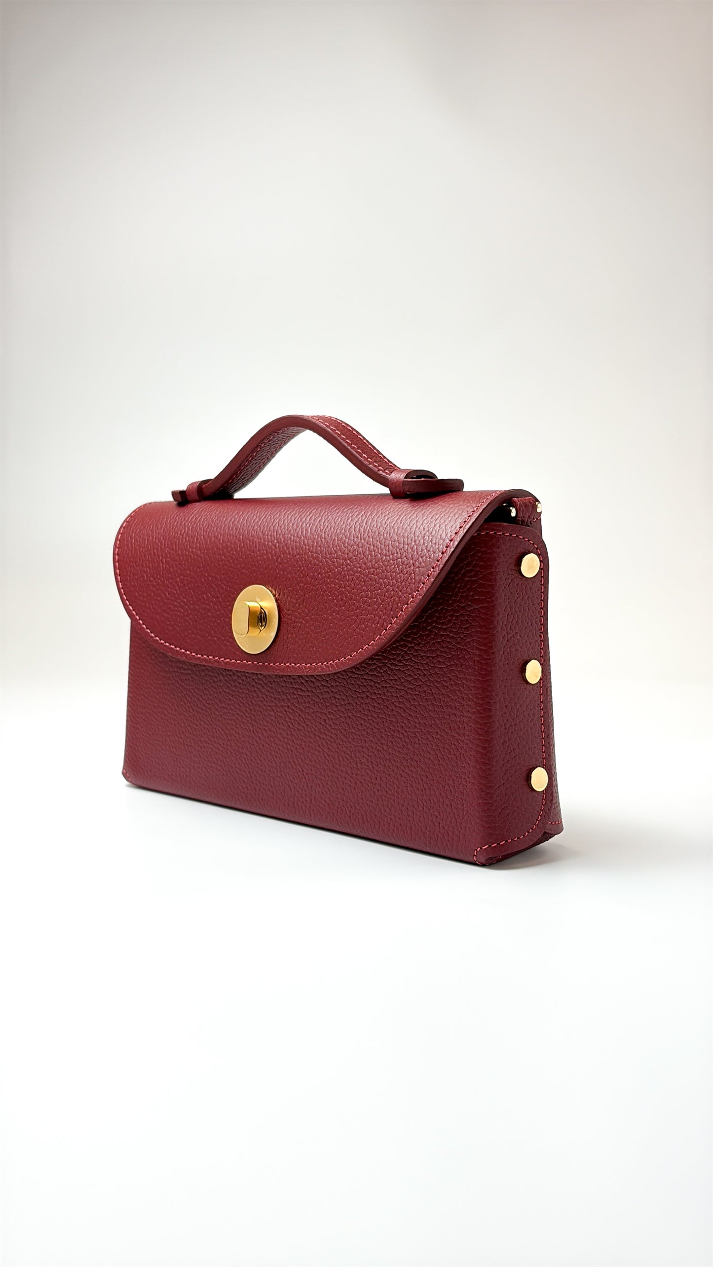 Sumi Crossbody Bag in Guinda with Gold Lock