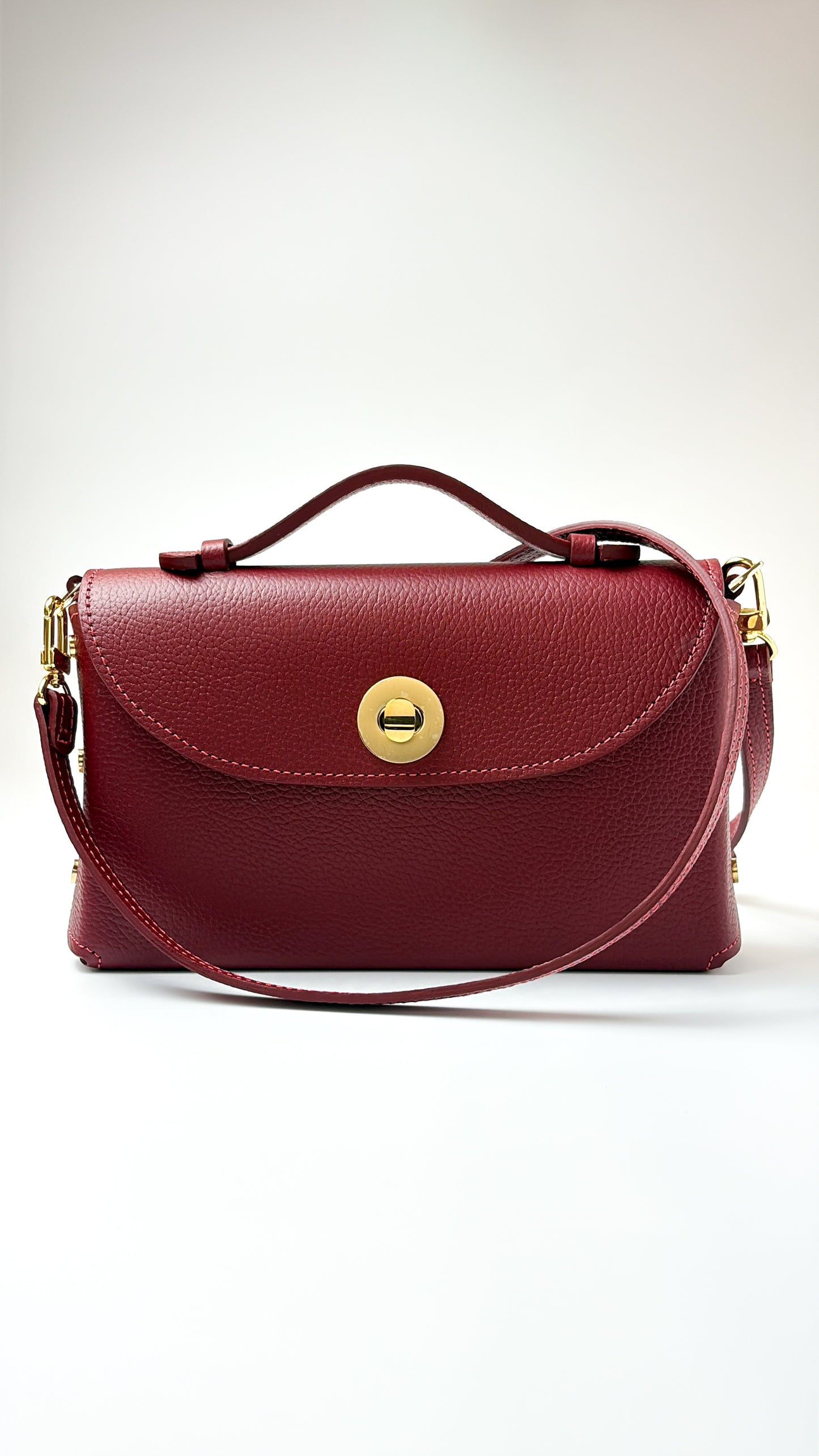 Sumi Crossbody Bag in Guinda with Gold Lock