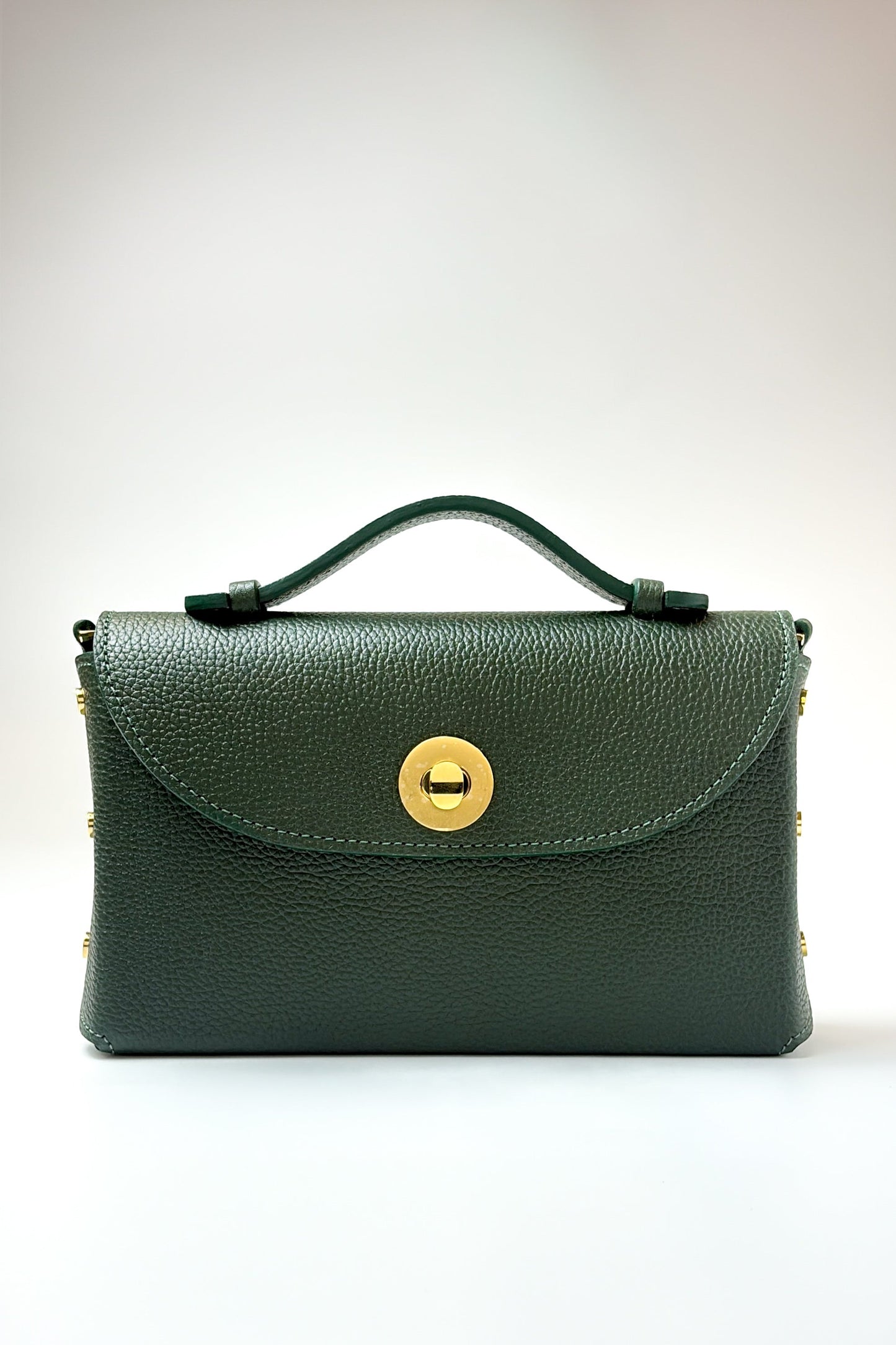 Green handbag with a gold clasp on a white background