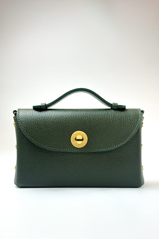 Green handbag with a gold clasp on a white background
