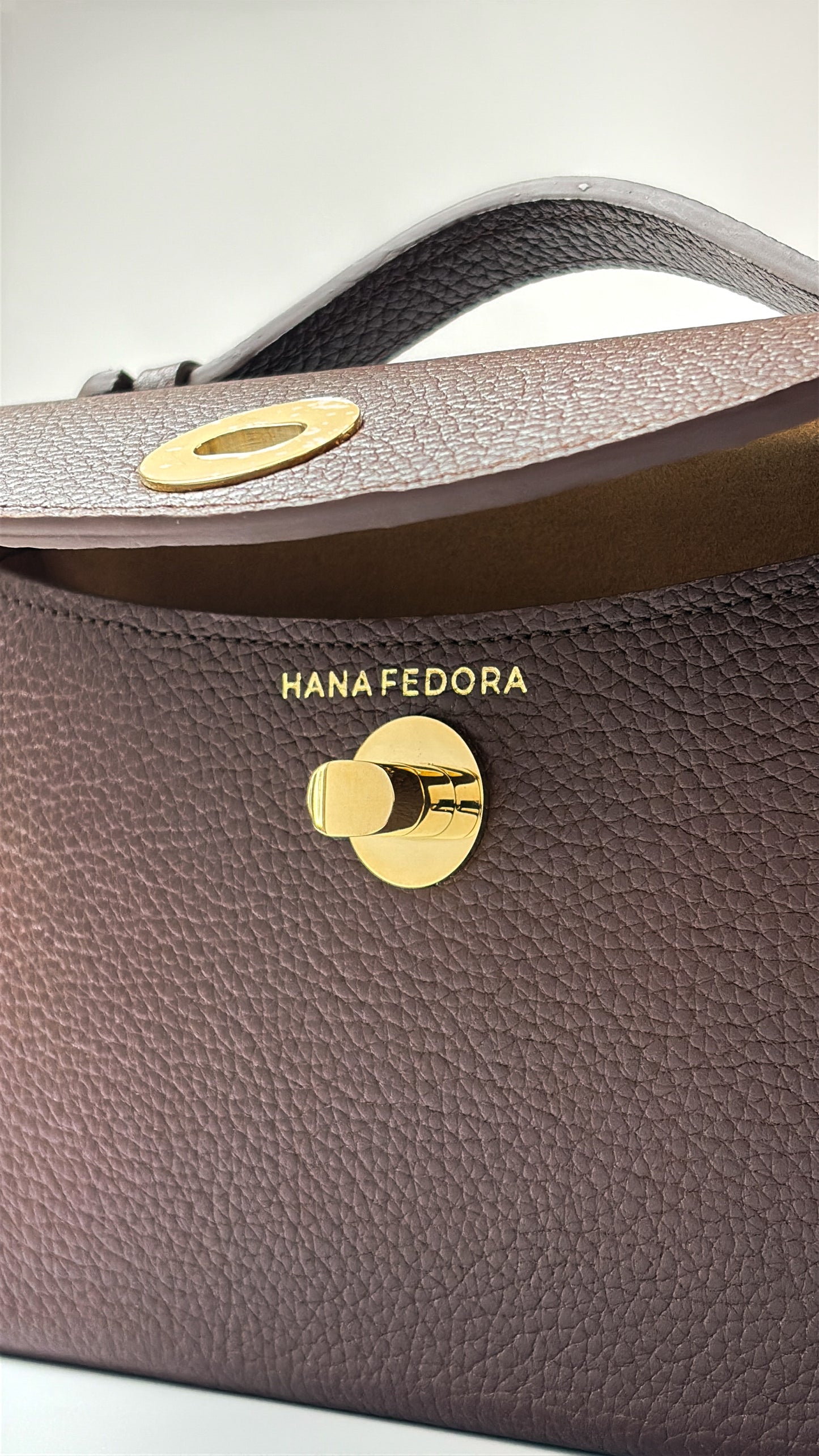 Sumi in Palisander with Gold Hardware