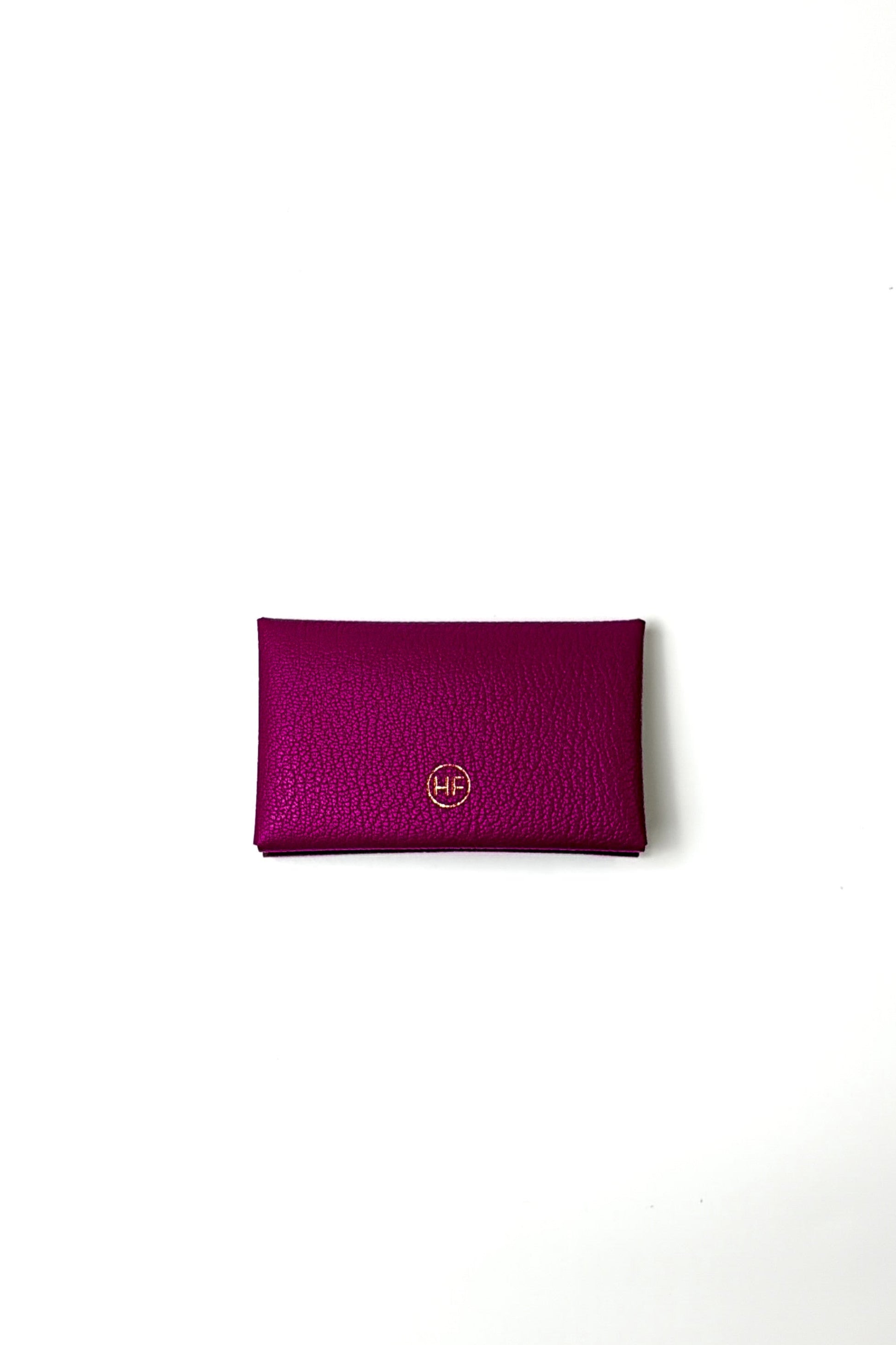 Purple pouch with a brand logo on a white background